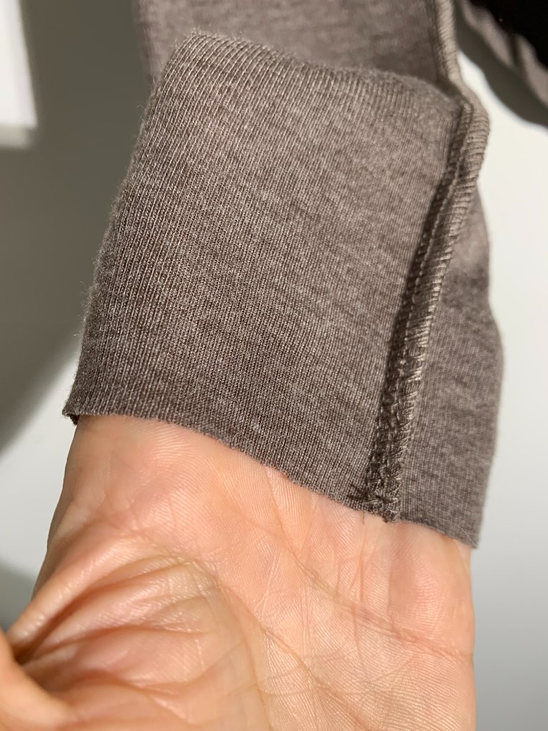 Aakasha Brown Turtleneck Top Asymmetric Tulip Hem Raw Edge Dystopian Nwot M — image 5 of 8